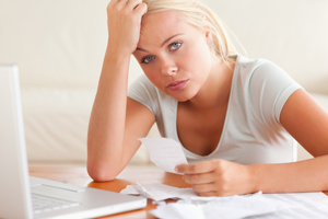 Young woman frustrated with her finances